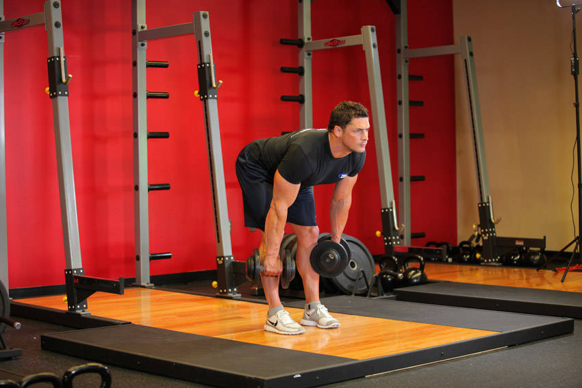 Stiff-Leg Dumbbell Deadlift end ki position
